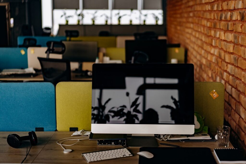 Modern small business office workspace with a desktop computer ready for setup