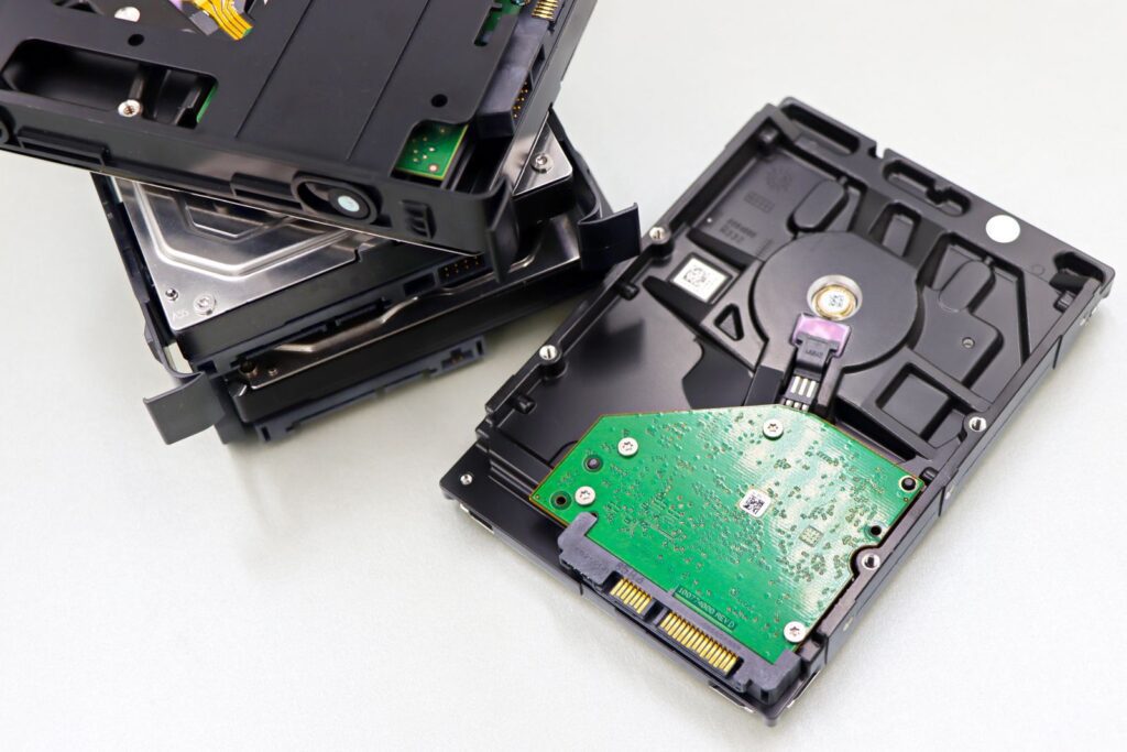 Stack of internal computer hard drives ready for secure data destruction