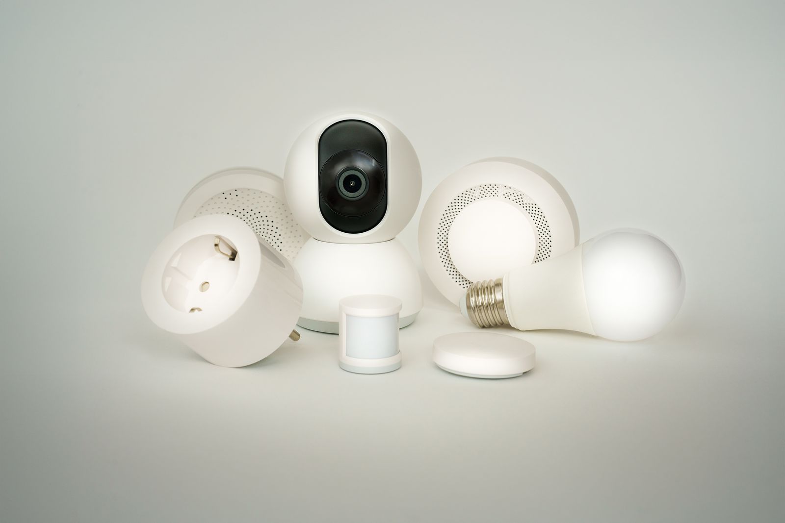 Smart home devices including a camera, light bulb, plug, and motion sensor