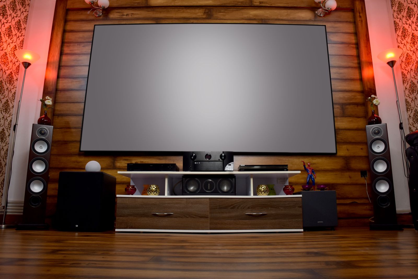 Home theater installation in Orlando with large screen, tower speakers and subwoofer