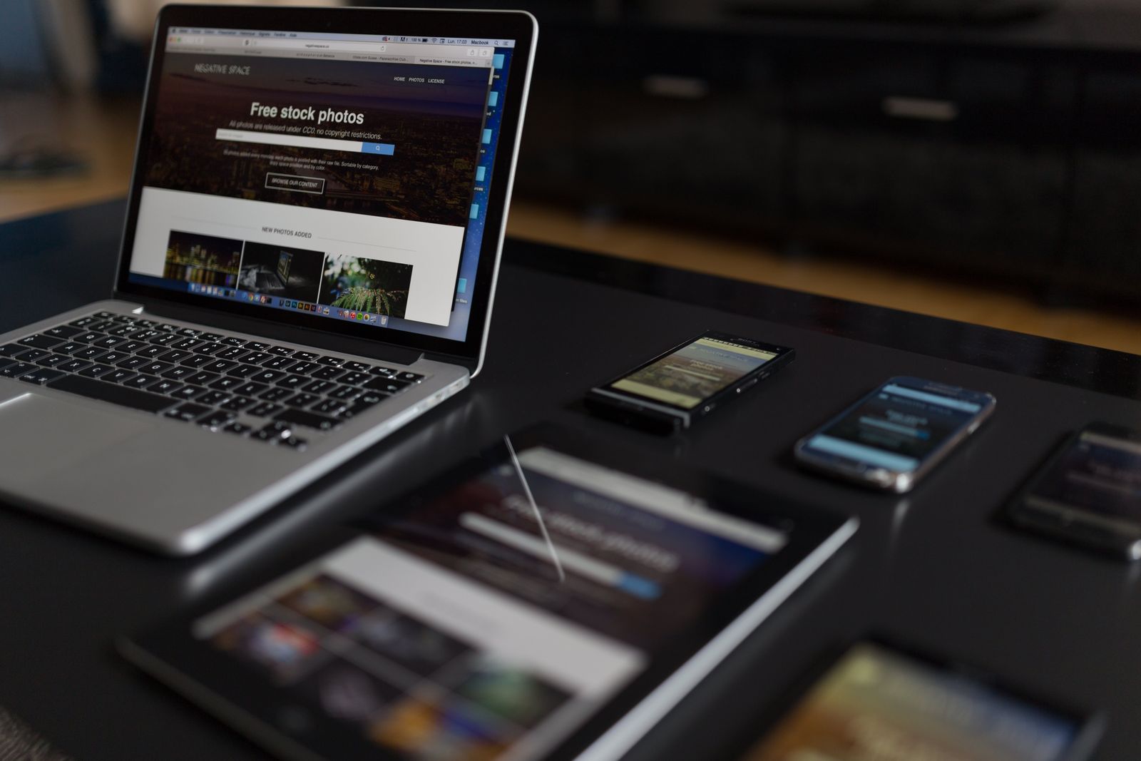 Responsive small business website shown on a laptop, tablet, and phones